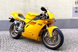 Image result for Nuget Yellow 1999 Motorcycle