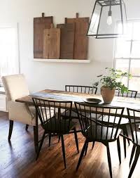 Simple Farmhouse Dining Room With Black Chairs And Rustic Wood Table Rustic Farmhouse Dining Table Farmhouse Dining Room Table Rustic Dining Room