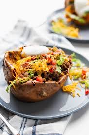 Extraordinary Taco Stuffed Sweet Potatoes 3 Scoops Of Sugar Recipe Sweet Potato Tacos Stuffed Baked Potatoes Food