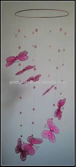 Pin By Madi Azar On Madison Room Hang From Ceiling Decor Butterfly Hanging Decorations Hanging Decor