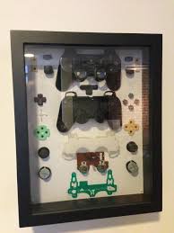 Cool Idea For Decorating A Game Room With Broken Controllers Love This Idea Spielzimmer Design Gameroom Ideen Basteln Und Selbermachen