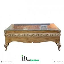 Superb quality walnut centre table, standing on a heavily carved quadra foil base with original porcelain castors. Tables