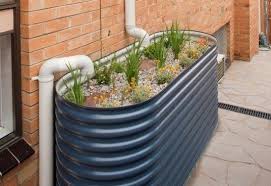 Melbourne Water Encourages Australian Citizens To Build 10 000 Rain Gardens Rain Garden Design Rain Garden Garden Design