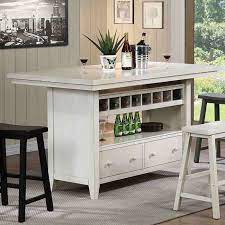Exposed shelving adds to the kitchen's country style, and the owner painted the cabinetry slightly darker than the walls for extra dimension. Antique White Island Eci Furniture Furniturepick