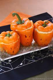 These Jack O Lantern Stuffed Peppers Double As A Centerpiece And A Yummy Party Dip Halloween Stuffed Peppers Stuffed Peppers Vegan Pot Pies