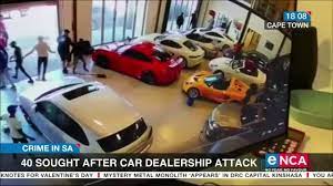 Colin booysen (black jacket, centre) and nafiz modack (white. Nafiz Modack Denies Involvement In Luxury Car Smashing South Africa Rich And Famous