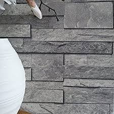 Create your featured walls, fireplace surrounds, and swimming pool water falls with our split face tiles. Split Face Tile Effect 3d Textured Faux Slate Stone Effect Wallpaper In Grey Tones Full Roll Amazon Co Uk Home Kitchen