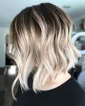 7 Striking Wavy Bob Hairstyles with Bangs to Copy