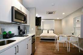 Our Fully Furnished Studio Apartment Homes Feature Renovated Interiors With High End Appliance And Furni Chair Design Apartments For Rent Apartment Communities