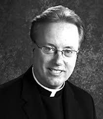 Devotion to St. John Paul II brings honor to pastor For their efforts  priests earn title of honorary Canon