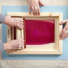 Before locking the print head into place above your shirt, make sure to flood the screen with ink. How To Screen Print Multiple Colors Diy Screen Printing Silk Screen Printing Screen Printing Shirts