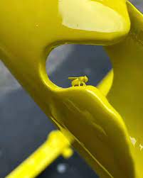 Poor little fly trapped in yellow paint RIP to this fly