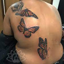Pin By Mona Gordon On Tattoos Piercings Butterfly Tattoo Skin Color Tattoos Tattoos For Black Skin