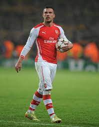 Lukas podolski jumped into the crowd to celebrate arsenal win over tottenham back in 2014 (picture: Pin On Football Unforgettable For Germany