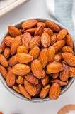What temperature should I roast almonds at?