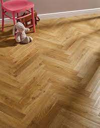 Vintage Chateau Herringbone Golden Brown Laminate Flooring Direct Wood Flooring