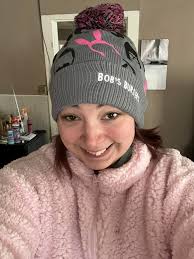 Does anyone know the gentleman with curly hair and a frog hat?