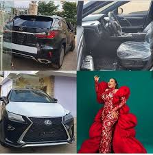 Film maker, Okiki Afolayan gifts wife Bimbo Afolayan a Lexus SUV for her  birthday