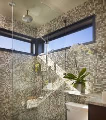 We start the inspiration off with this gorgeous bronze subway tiled shower. 25 Glass Shower Doors For A Truly Modern Bath