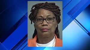 Woman charged with exploiting her 84-year-old mother