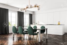 Designer accessories in a modern kitchen. Luxury Dining Room And Kitchen Interior With A Dark Wooden Floor Stock Photo Picture And Royalty Free Image Image 100556797