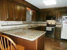 Two door cabinet with three drawers and two interior shelves. St Cecilia Granite On Dark Cabinets Traditional Kitchen Charlotte By Fireplace Granite Distributors Houzz
