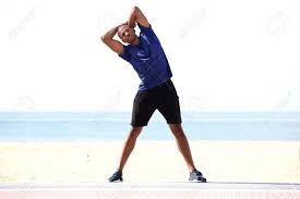 Full Length Portrait Of Healthy Black Man Stretching In Morning On Beach  Stock Photo, Picture and Royalty Free Image. Image 83124732.