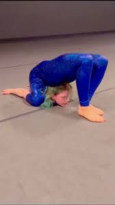 Bunni B Bendi flexibility pose - erotic shot from EroMe archives