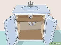 Bathroom vanities typically feature a sink as well as a cabinet for storing toiletries, cleaning products, towels and other items. How To Paint A Bathroom Vanity With Pictures Wikihow