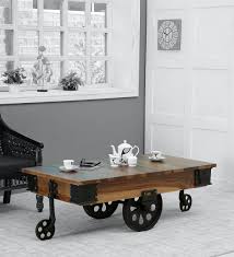 Antique white/honey aged distressed pine large rectangle wood coffee table with drawers. Buy Jonas Coffee Table With Wheels In Rustic Teak Finish Bohemiana By Pepperfry Online Industrial Rectangular Coffee Tables Tables Furniture Pepperfry Product
