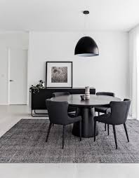 Maybe you would like to learn more about one of these? Black Round Dining Table With Black Pendant Light Console And Black Patterned Rug Round Dining Table Dinning Tables And Chairs Living Dining Room