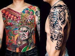 Also has strength, but on her right shoulder. Chinese Ci Shen And Paiwan Tattoo Style Tattoo