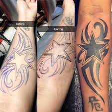 Black ink cowboy with gun tattoo on man side rib. Dallas Cowboys Tattoo Cowboy Tattoos Dallas Cowboys Tattoo Tribal Arm Tattoos