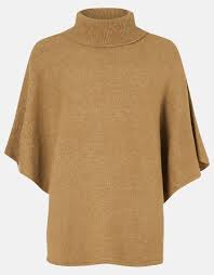 Check out our cozy knits selection for the very best in unique or custom, handmade pieces from our cozies shops. Cosy Knit Poncho Blanket Scarves Accessorize Global