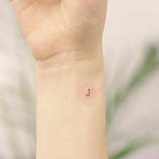 Picking a font for your next tattoo is a very important decision. Minimalist Letter J Tattooed On The Wrist