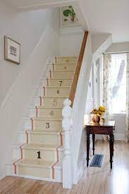 Sarah Richardson S Cottage Painted Staircase Runner With Found House Numbers Stairway Decorating Sarah Richardson Farmhouse Painted Staircases