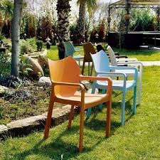 Diva Resin Outdoor Patio Dining Arm Chair In Orange Set Of 4 Compamia Outdoor Dining Chairs Outdoor Chairs Outdoor Furnishings