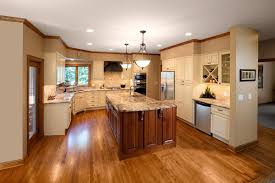 Everyone knows the white shaker kitchen cabinet is a timeless piece that fits into almost any kitchen, well with the. Kitchen Has White Cabinets With Dark Wood Island Sattler Homes