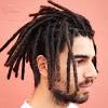 Modern and cool, dreads can be worn short or long, with a taper fade or undercut on… 1