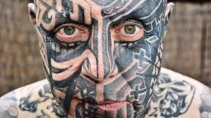 Image result for quirky pylon forehead tattoo