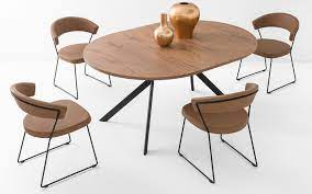 This dining table features a round top and fixed central metal base with four elliptical sloping legs that give the piece a distinct appearance. Connubia Giove Cb 4739 Round Extendable Table With Metal Frame With Melamine Top Tempered Glass Ceramic Vieffetrade