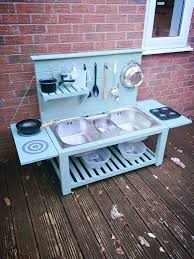 Matschkuche Im Garten Blau Angemalt Und Mit Viel Zubehor Angemalt Blau Garten Im Matschkuche M Outdoor Play Kitchen Mud Kitchen Mud Kitchen For Kids