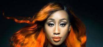 Looking at her and seeing those captivating curves. Victoria Kimani Blows Hot In Orange Photos