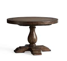 Inspired by traditional spanish furniture, it's built on a bold scale and features a pedestal base at each end. Lorraine Extending Pedestal Table 48 72 L Hewn Oak Pottery Barn Havenly