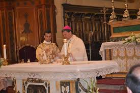 DSC_0142 Deacon Daniel hands the chalice to the Bishop
