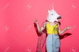 Funny Woman In Fashionable Transparent Raincoat And Unicorn Mask Stock Photo Picture And Royalty Free Image Image 112312715 Discover and share the best gifs on tenor. funny woman in fashionable transparent raincoat and unicorn mask