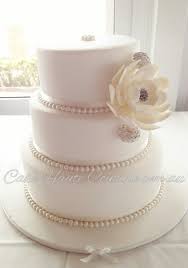 Pearl Wedding Cake We Could Add A Colored Ribbon Or A Lace Ribbon Behind The Pearls A Touch Of C Wedding Cake Pearls Round Wedding Cakes Wedding Cake Ribbon