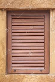 It's important to review the various window wall types and their respective characteristics thoroughly for advantages and disadvantages before making your selection. Wooden Window On Brown Cement Design Wall Stock Photo Picture And Royalty Free Image Image 32591861