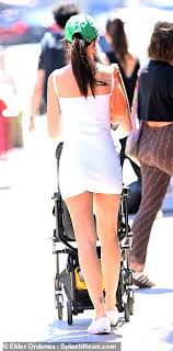 Emily ratajkowski commemorates birth of baby boy with two gold necklaces. Emily Ratajkowski Looks Radiant In White As She Goes For Brunch In Tribeca With Baby Sylvester Fr Fr24 News English