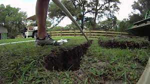 How to run conduit under driveway with tight space? How To Run Pipe Under A Driveway Youtube